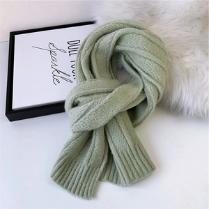 Thick light green striped knitted scarf for winter made of soft blended yarn for warmth