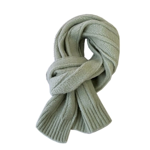 Thick knit light green scarf with ribbed edges for winter warmth in soft solid color