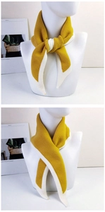 Detail of yellow knitted scarf showing texture and two elegant styling ways on a mannequin