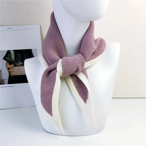Knit burgundy triangle scarf with cream trim shown on model for autumn winter style
