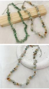 Detail of natural irregular stone beads with adjustable silver lobster clasp and extension chain
