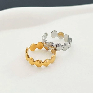 Minimalist shell-shaped stainless steel rings in gold and silver, open adjustable design