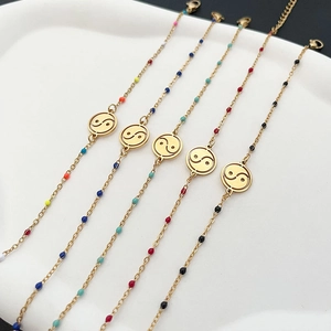 Five-piece gold stainless steel bracelets set with Tai Chi charms and colorful beads