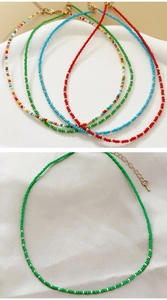 Detail of handmade beaded choker with colorful rice beads and gold adjustable lobster clasp