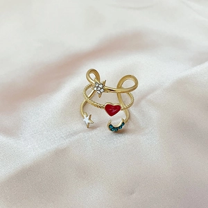Adjustable gold layered ring featuring colorful enamel heart and zircon star moon charms