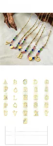 Detail of colorful bead letter necklace with 38cm chain and 4cm extension length