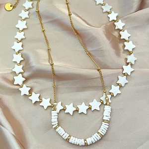 Vintage gold layered necklace with white star beads and stainless steel pendant