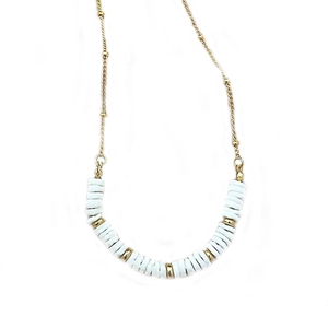 French vintage gold beaded star necklace with white shell discs on white background