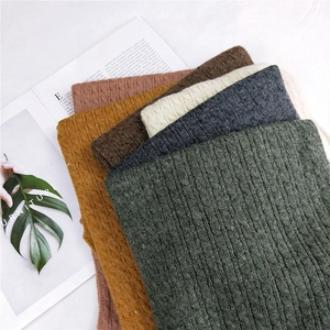 Chunky cable knit winter scarves for women in various colors with thick soft texture