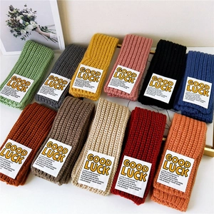 Knitted GOOD LUCK letter scarves in multiple colors for winter warmth and cozy style