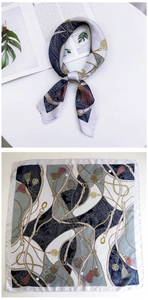 Detail of elegant 70cm square scarf featuring classic golden chain and paisley patterns