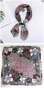 Flat lay of silk square scarf featuring floral and leopard print with pink and grey tones