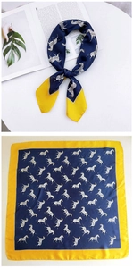 Detail of square silk scarf with zebra print in navy blue and yellow contrasting edges