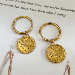 Vintage 18K gold plated stainless steel sunburst charm hoop earrings with radiant pattern