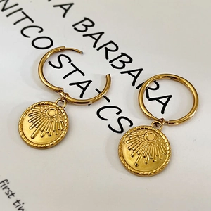 18K gold plated stainless steel hoop earrings with sunburst sun coin pendants