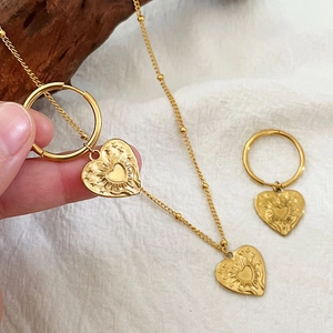 French style gold plated stainless steel jewelry set with embossed heart pendants