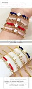 Detail of 18K gold stainless steel double layer bracelet with red beads and star pendant