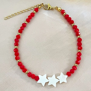 Handmade beaded bracelet with red faceted crystals and white shell star charms