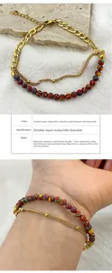Double-layer stainless steel bracelet featuring gold curb chain and natural stone beads