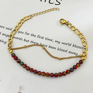 Double-layered golden stainless steel bracelet with natural stone beads and Figaro chain
