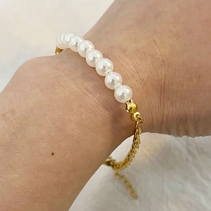 Bohemian stainless steel pearl bracelet with gold chain and adjustable lobster clasp closure