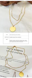 Detail of double-layer golden stainless steel necklace with 40/45cm chain and round pendant