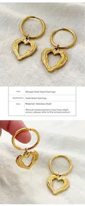 Details von geflügelten Herzanhängern an 18K vergoldeten Edelstahl-Creolen