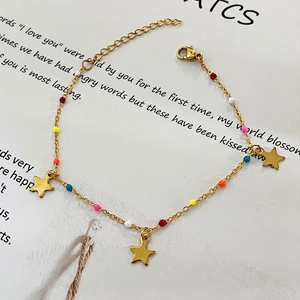 Bohemian gold stainless steel bracelet featuring colorful beads and star charms