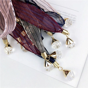 Striped skinny scarf with gold metal tip and crystal pendant accessory for women