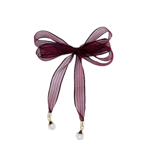 Fuchsia striped sheer ribbon bow with blue lines and white crystal metal pendants