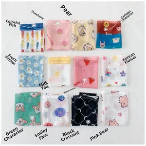 Detail view of 12 patterns of mesh sun protection sleeves featuring cute cartoon prints