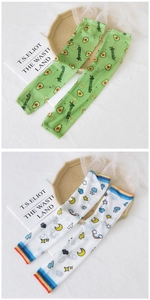 Detail view of avocado and weather themed sun protection arm sleeves with cute prints