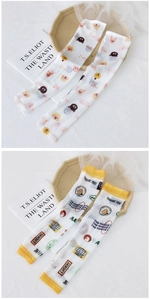 Detail of cute printed mesh cooling arm sleeves with sun protection and elastic fabric