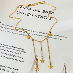 Chic gold star tassel necklace for women featuring minimalist stainless steel star pendants