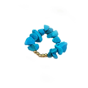 Bohemian elastic ring with irregular turquoise stones and golden metallic beads
