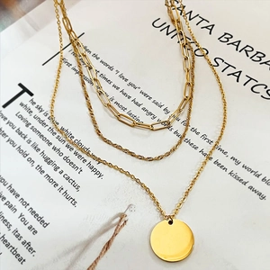 Three-layer gold stainless steel necklace with paperclip chain, rope chain and round pendant