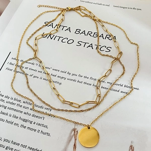 Three-layer gold stainless steel necklace set with paperclip chain and round pendant