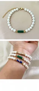 Detail view of pearl beaded bracelets with colorful natural stones and golden lobster clasps