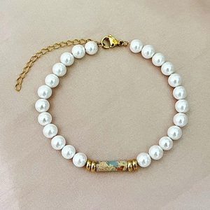 Minimalist pearl beaded bracelet with marble stone accent and gold lobster clasp
