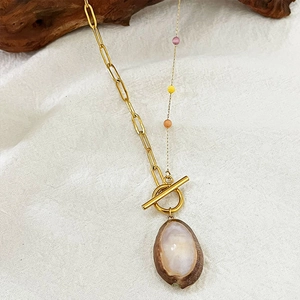 Chic gold paperclip chain necklace with colorful beads and natural shell pendant