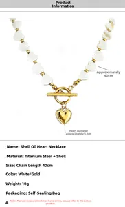 Detail view of gold heart shell bead necklace with OT buckle dimensions and specs