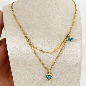 Double-layered 18K gold plated necklace featuring turquoise heart and raw stone pendants