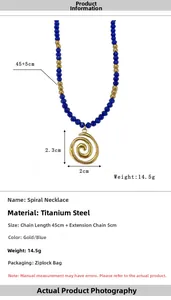 Detail view of titanium steel necklace with blue beads and gold spiral pendant charm