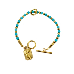 Bohemian blue turquoise beaded bracelet with gold palm charm and toggle clasp