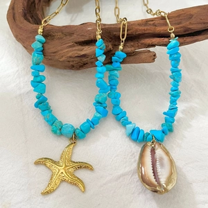 Bohemian multi-layer necklace with turquoise beads, golden starfish and shell pendants