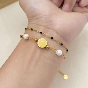 Double-layered gold stainless steel bracelet with Virgin Mary pendant and white pearls