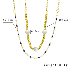 Double layered gold plated titanium steel necklace with white pearls and blue beads accents
