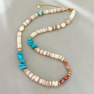 Bohemian beaded necklace with turquoise stone, white pearls and shells in S-shape layout