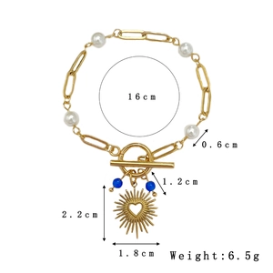 18K gold plated titanium bracelet with pearls, blue beads and sun heart pendant