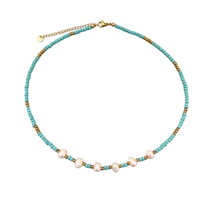 Handmade sky blue beaded necklace with white baroque pearls and a golden lobster clasp